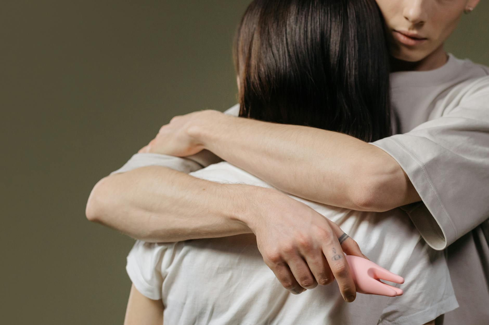 Close-up of a couple embracing, highlighting intimacy and connection and communication about preferences